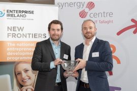 Eoghan Doyle from Philip Lee Ltd presents first prize to Oisin Hurley from start up company Talk2MeMore
